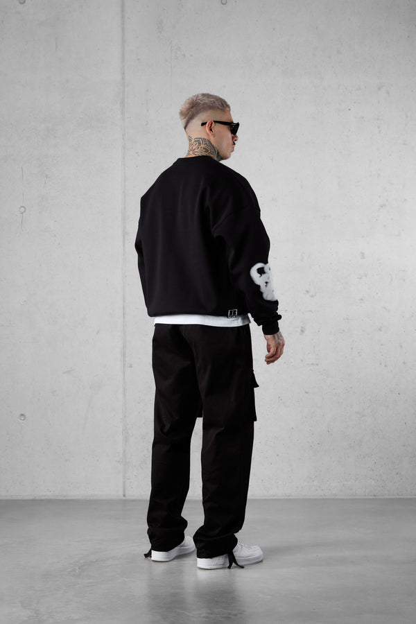 BLACK BLURRED HEARTS OVERSIZED SWEATER