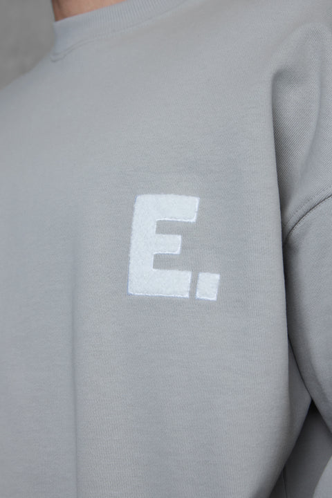 GREY E. STATEMENT OVERSIZED SWEATER