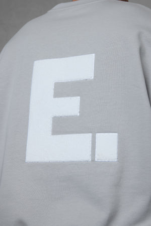 GREY E. STATEMENT OVERSIZED SWEATER